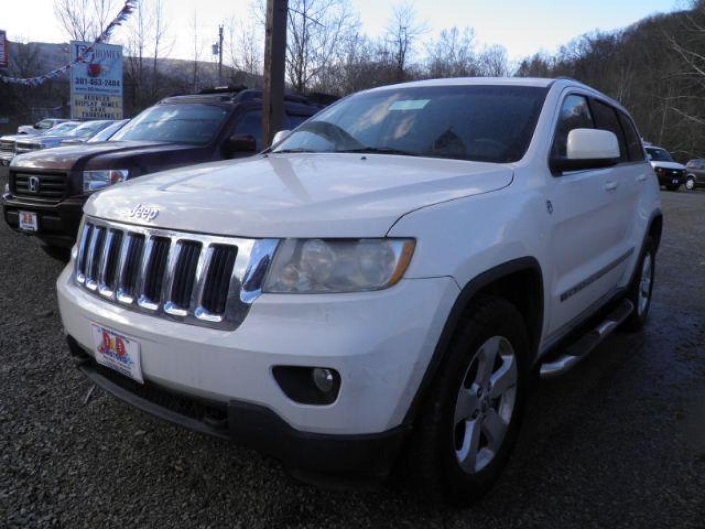 2012 WHITE Jeep Grand Cherokee Laredo (1C4RJFAG3CC) with an 3.6L V6 engine, AT transmission, located at 19521 New George's Creek Rd SW, Barton, MD, 21521, (301) 463-2404, 39.524323, -79.017906 - Photo#0