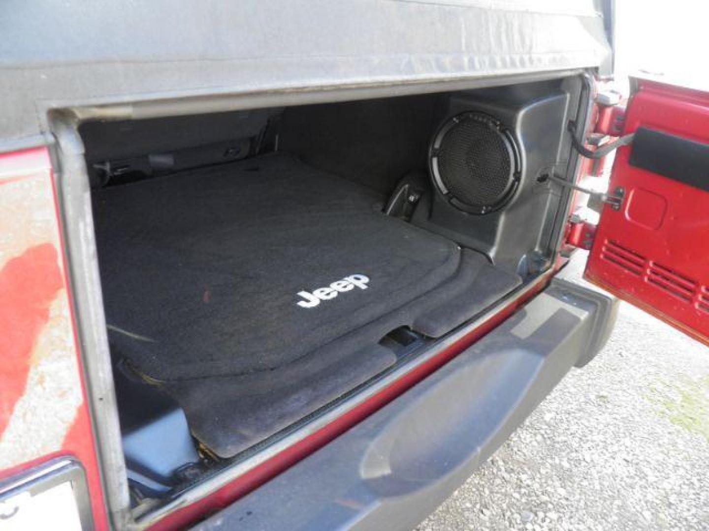 2012 RED Jeep Wrangler Unlimited Sport 4WD (1C4BJWDG6CL) with an 3.6L V6 engine, 6SP transmission, located at 19521 New George's Creek Rd SW, Barton, MD, 21521, (301) 463-2404, 39.524323, -79.017906 - Photo#4