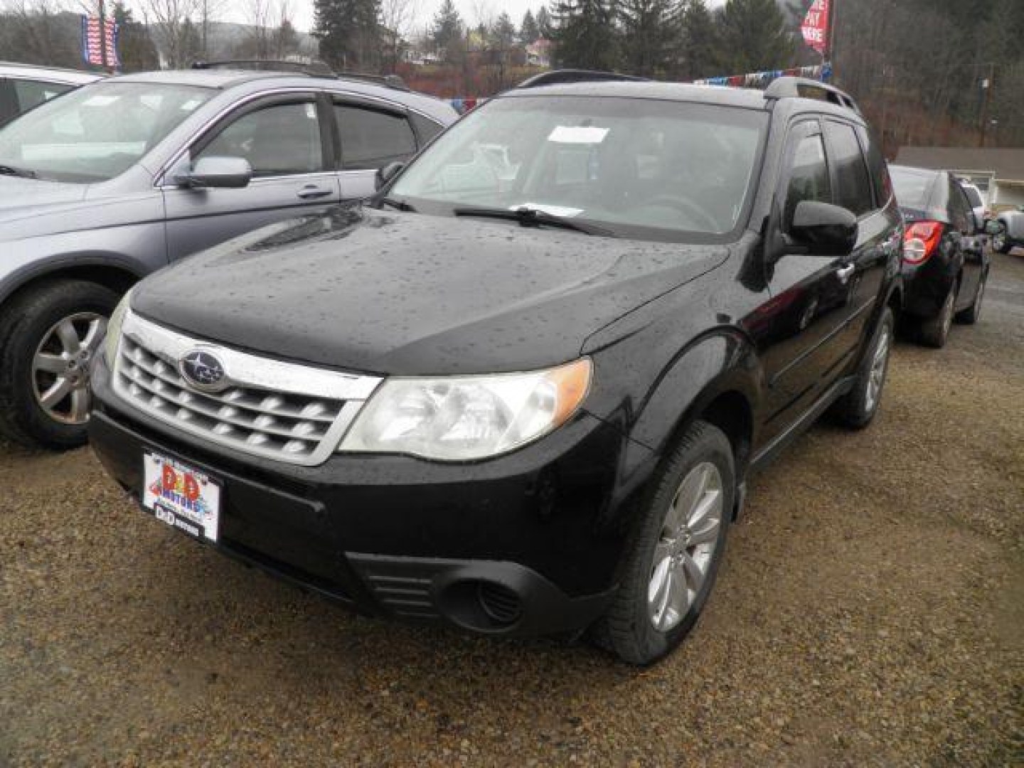 2012 BLACK Subaru Forester 2.5X Premium (JF2SHBDC1CH) with an 2.5 L4 engine, CVT transmission, located at 19521 New George's Creek Rd SW, Barton, MD, 21521, (301) 463-2404, 39.524323, -79.017906- Photo#0