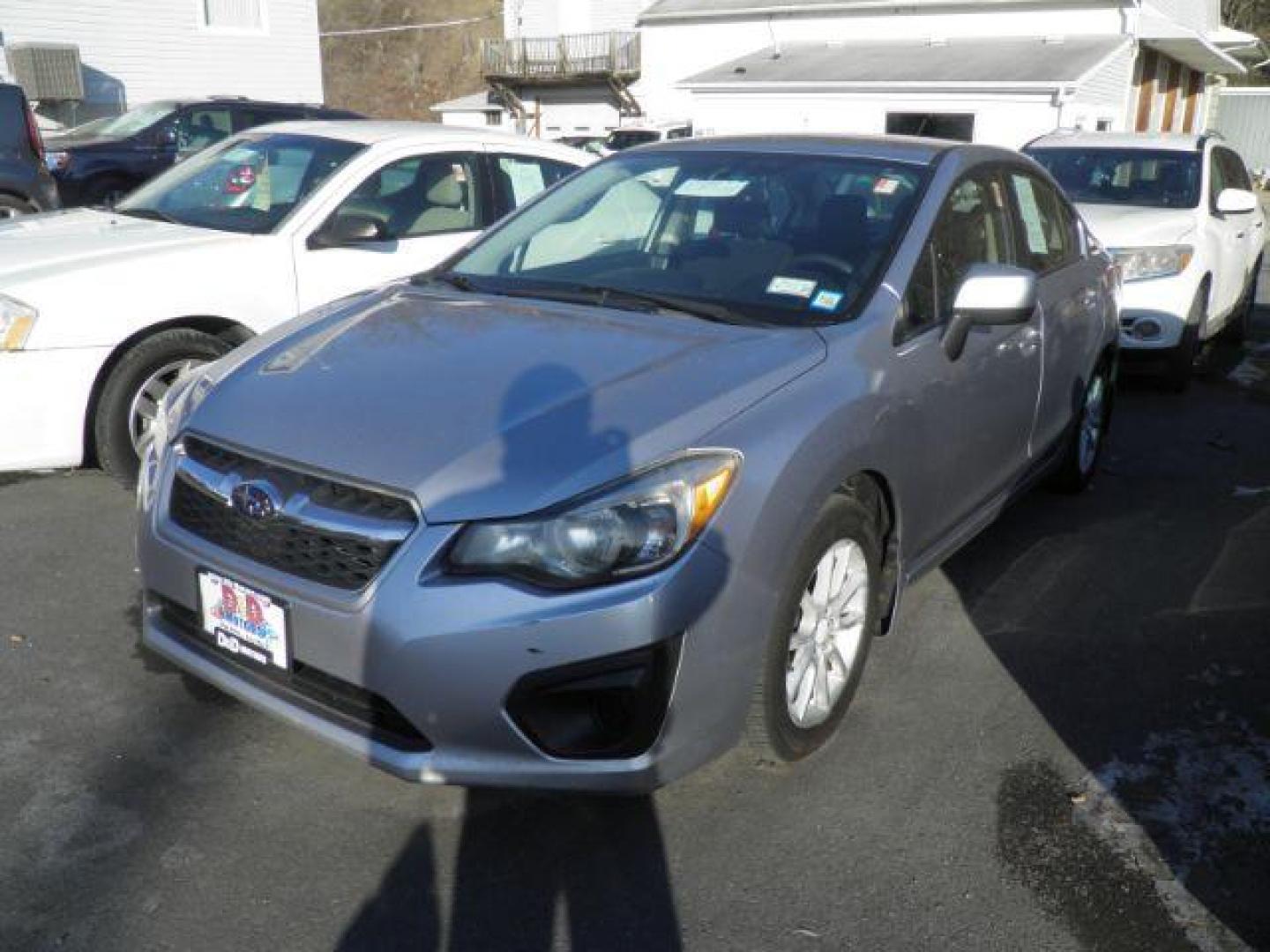 2012 Silver Subaru Impreza Premium 4-Door w/All Weather Package (JF1GJAC61CH) with an 2.0L H4 engine, AT transmission, located at 15520 McMullen Hwy SW, Belair, MD, 21502, (301) 729-3700, 39.581375, -78.846451 - Photo#0