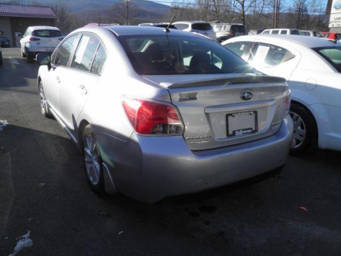 2012 Silver Subaru Impreza Premium 4-Door w/All Weather Package (JF1GJAC61CH) with an 2.0L H4 engine, AT transmission, located at 15520 McMullen Hwy SW, Belair, MD, 21502, (301) 729-3700, 39.581375, -78.846451 - Photo#4