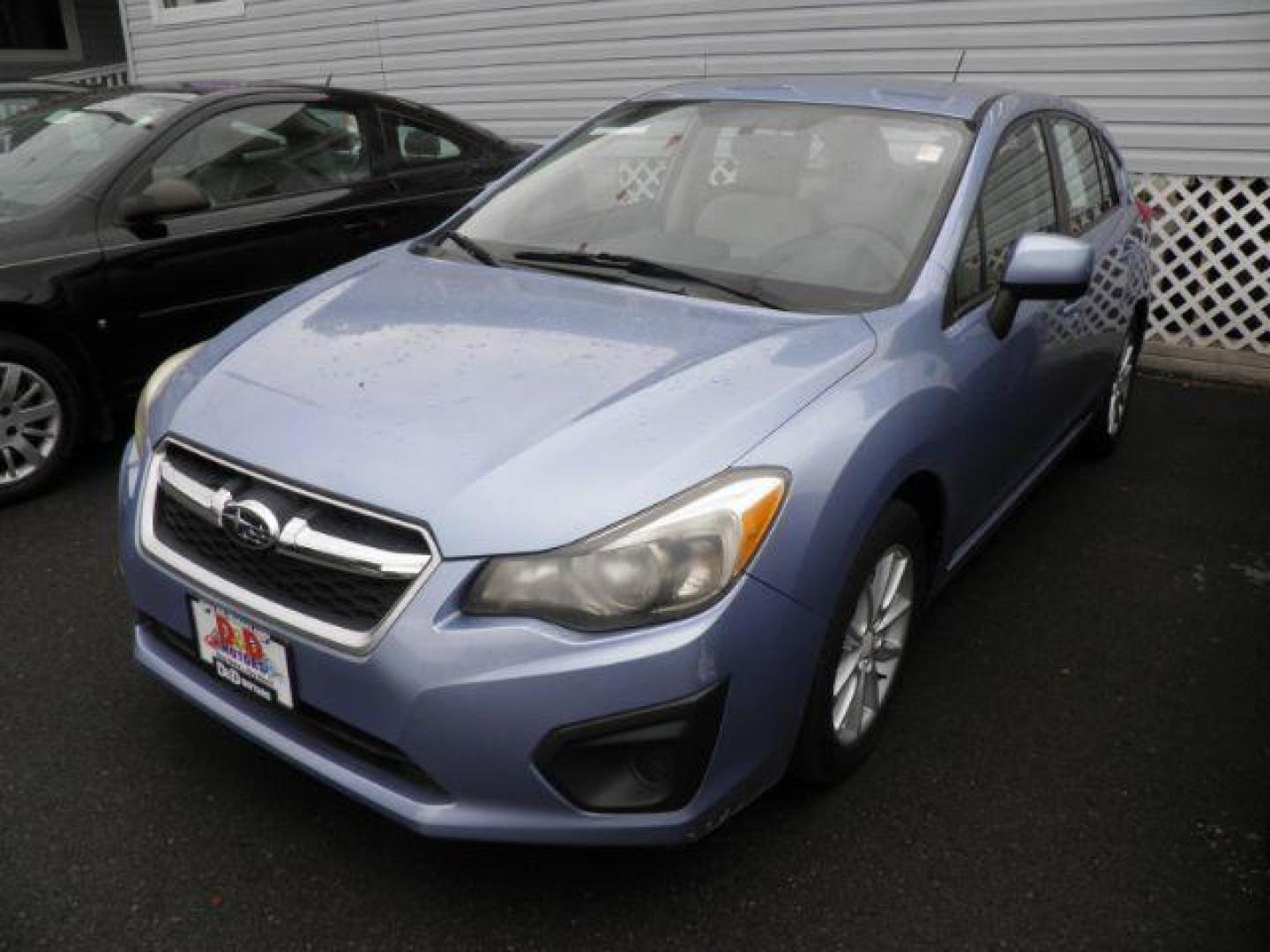 2012 Blue Subaru Impreza 2.0i Premium (JF1GPAC65CH) with an 2.0L H4 engine, AT transmission, located at 15520 McMullen Hwy SW, Belair, MD, 21502, (301) 729-3700, 39.581375, -78.846451 - Photo#0
