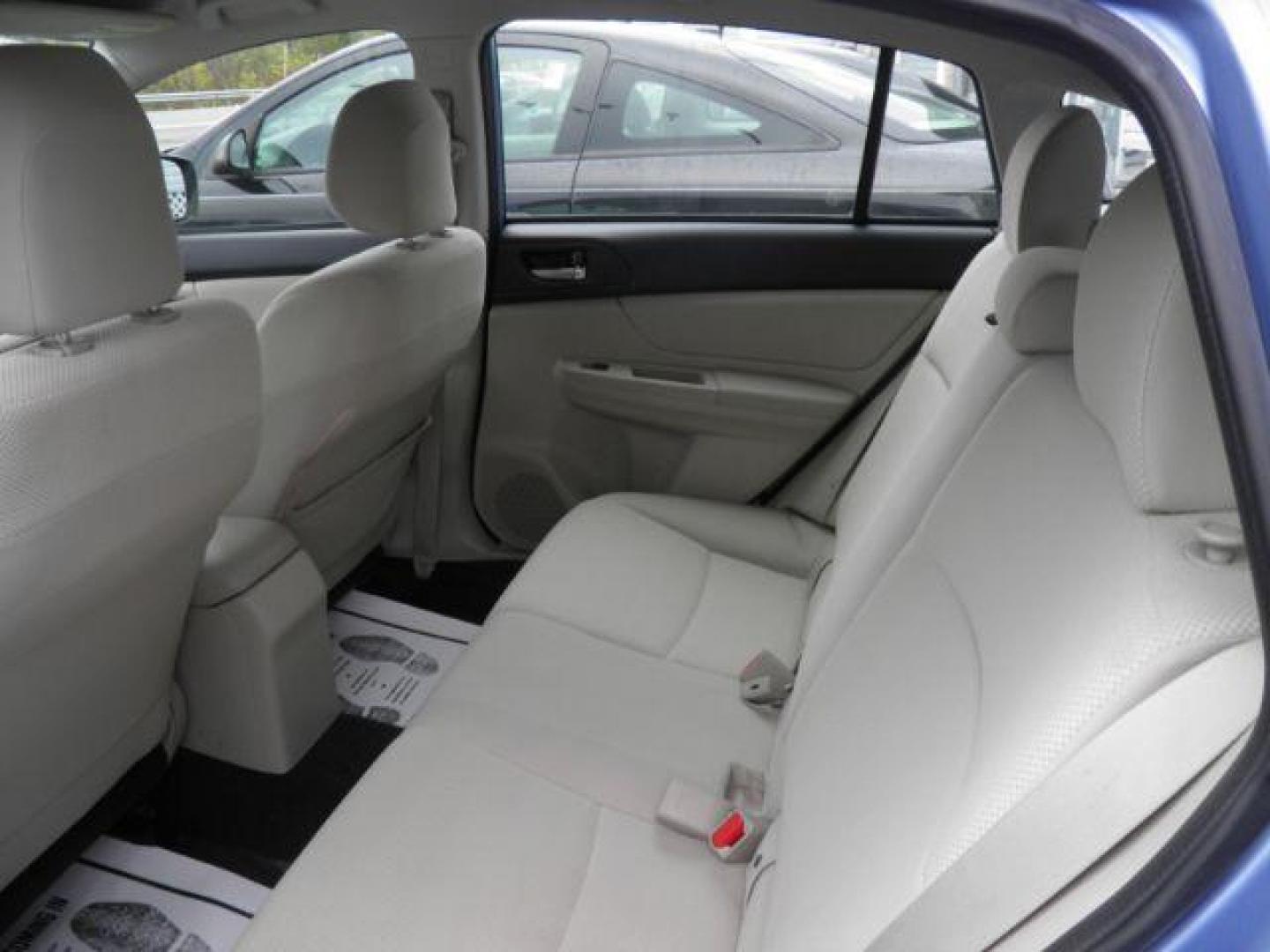 2012 Blue Subaru Impreza 2.0i Premium (JF1GPAC65CH) with an 2.0L H4 engine, AT transmission, located at 15520 McMullen Hwy SW, Belair, MD, 21502, (301) 729-3700, 39.581375, -78.846451 - Photo#3