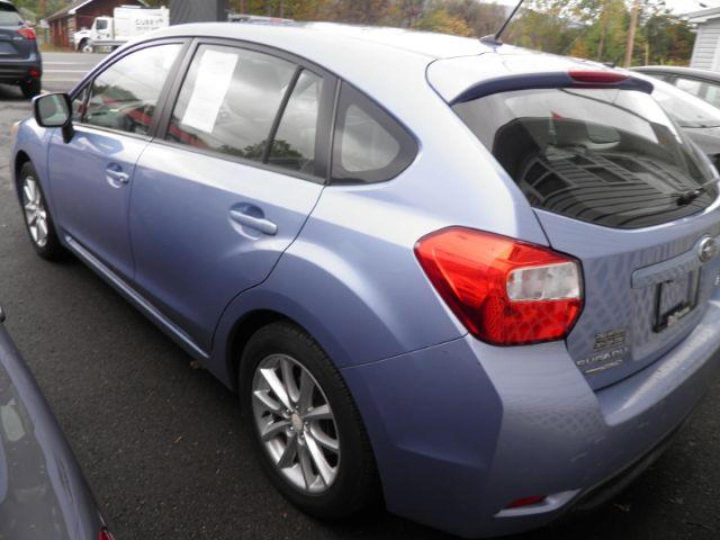 2012 Blue Subaru Impreza 2.0i Premium (JF1GPAC65CH) with an 2.0L H4 engine, AT transmission, located at 15520 McMullen Hwy SW, Belair, MD, 21502, (301) 729-3700, 39.581375, -78.846451 - Photo#5