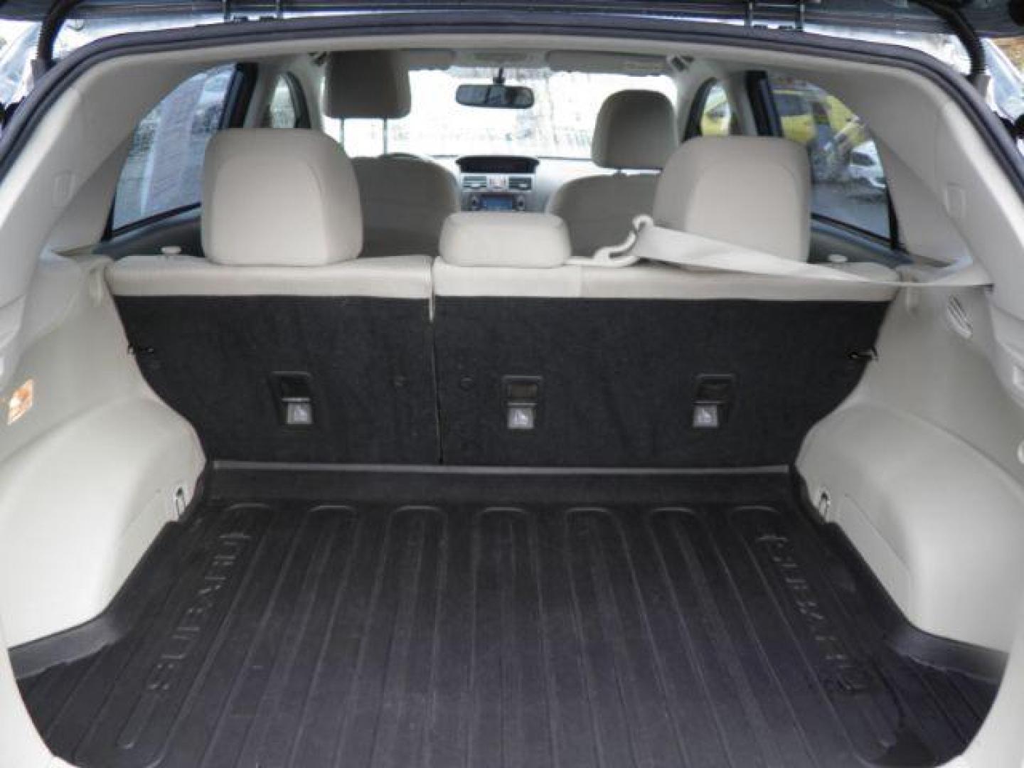 2012 Blue Subaru Impreza 2.0i Sport Premium (JF1GPAL67CH) with an 2.0L H4 engine, AT transmission, located at 15520 McMullen Hwy SW, Belair, MD, 21502, (301) 729-3700, 39.581375, -78.846451 - Photo#4