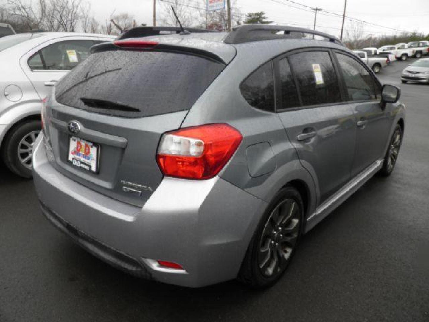 2012 Blue Subaru Impreza 2.0i Sport Premium (JF1GPAL67CH) with an 2.0L H4 engine, AT transmission, located at 15520 McMullen Hwy SW, Belair, MD, 21502, (301) 729-3700, 39.581375, -78.846451 - Photo#5