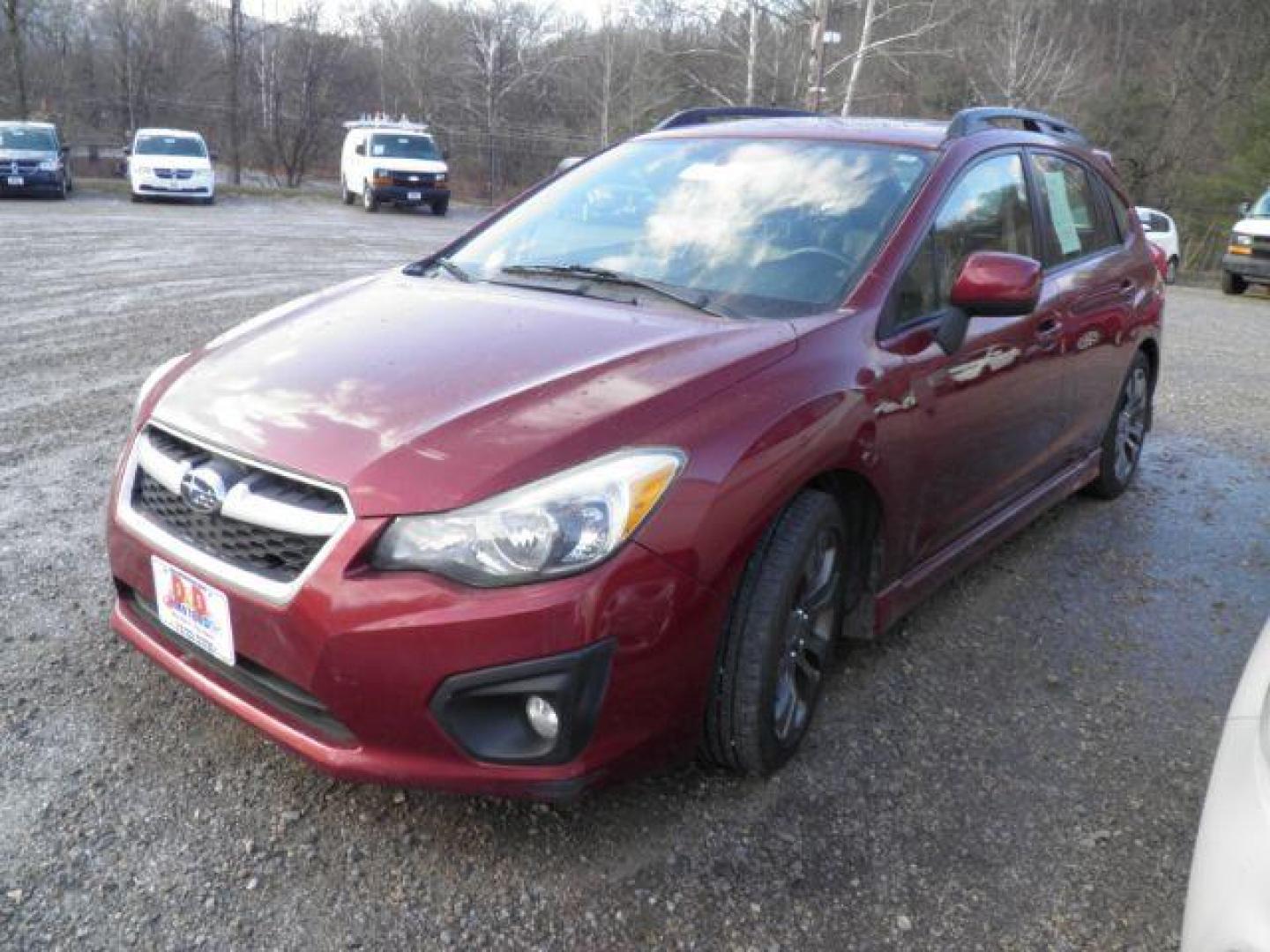 2012 RED Subaru Impreza 2.0i Sport Limited (JF1GPAS60CH) with an 2.4L 4 engine, CVT transmission, located at 19521 New George's Creek Rd SW, Barton, MD, 21521, (301) 463-2404, 39.524323, -79.017906 - Photo#0