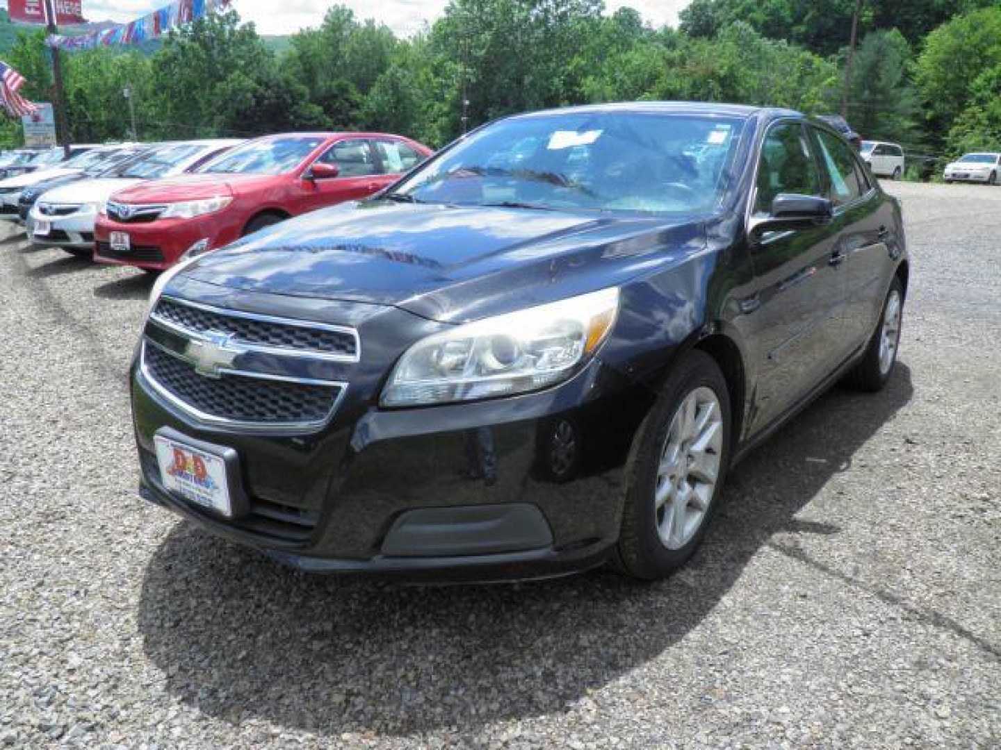 2013 BLACK Chevrolet Malibu 1LT (1G11C5SA7DF) with an 2.5 L4 engine, AT transmission, located at 19521 New George's Creek Rd SW, Barton, MD, 21521, (301) 463-2404, 39.524323, -79.017906- Photo#0