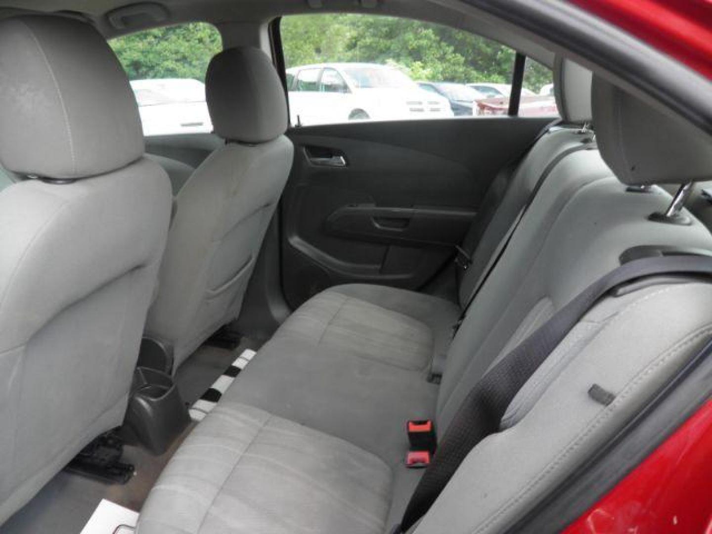 2013 Red Chevrolet Sonic LT Auto Sedan (1G1JC5SH0D4) with an 1.8L I4 engine, AT transmission, located at 19521 New George's Creek Rd SW, Barton, MD, 21521, (301) 463-2404, 39.524323, -79.017906 - Photo#3