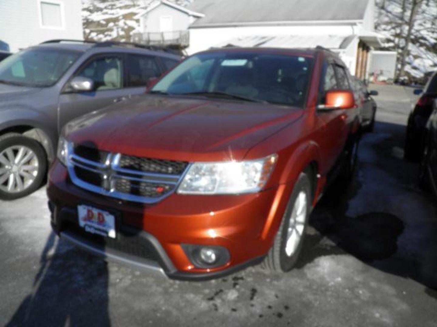 2013 Orange Dodge Journey SXT (3C4PDDBG2DT) with an 3.6L V6 engine, AT transmission, located at 15520 McMullen Hwy SW, Belair, MD, 21502, (301) 729-3700, 39.581375, -78.846451 - Photo#0