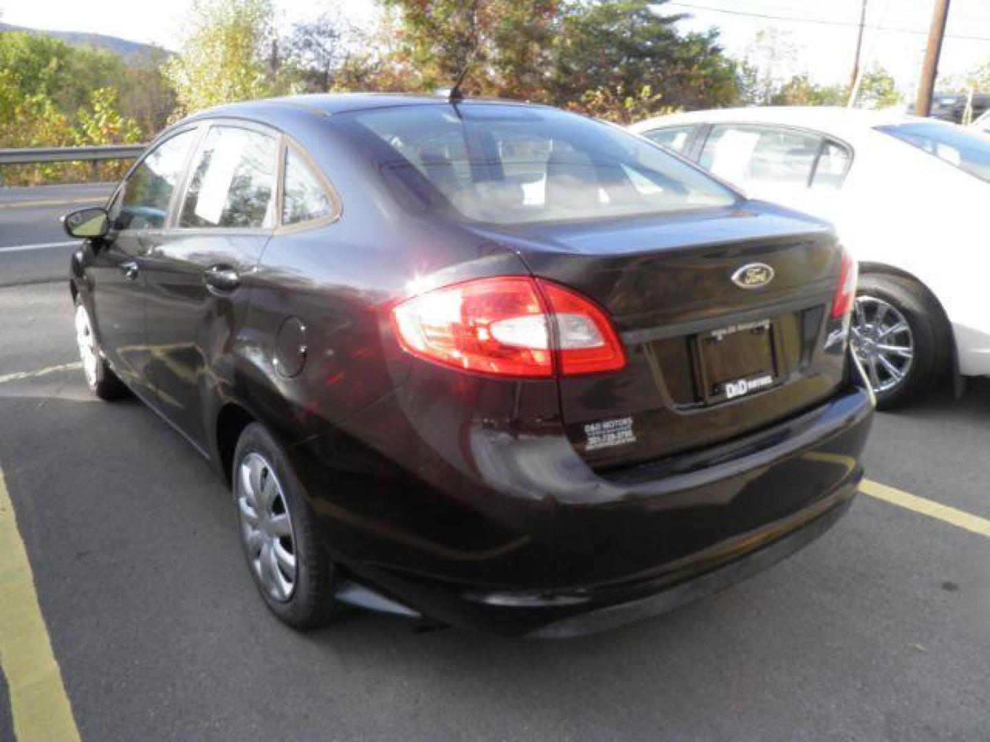 2013 Black Ford Fiesta S Sedan (3FADP4AJ2DM) with an 1.6L I4 engine, MAN transmission, located at 15520 McMullen Hwy SW, Belair, MD, 21502, (301) 729-3700, 39.581375, -78.846451 - Photo#4