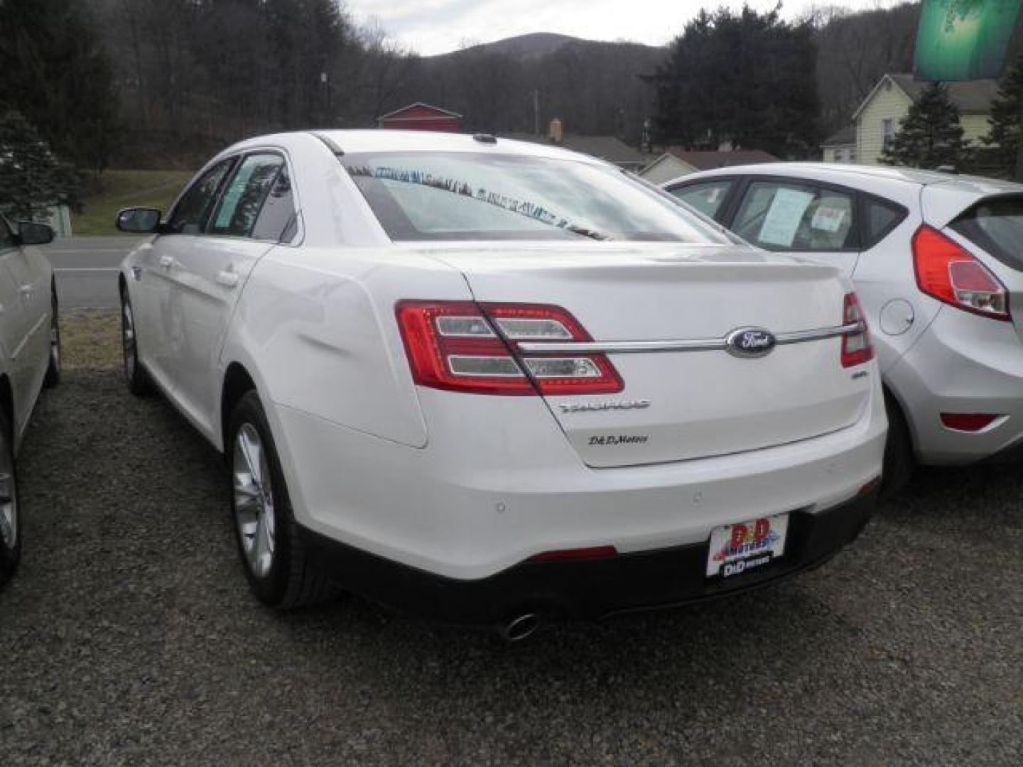 2013 WHITE Ford Taurus SEL FWD (1FAHP2E82DG) with an 3.5L V6 engine, AT transmission, located at 19521 New George's Creek Rd SW, Barton, MD, 21521, (301) 463-2404, 39.524323, -79.017906 - Photo#4