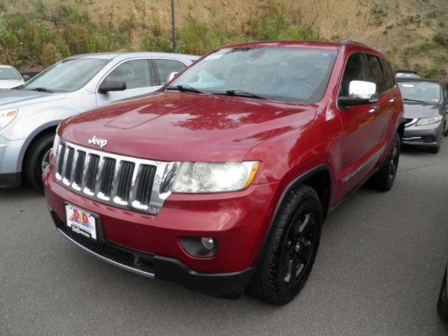 2013 Red Jeep Grand Cherokee Limited 4WD (1C4RJFBT0DC) with an 5.7L V8 engine, AT transmission, located at 15520 McMullen Hwy SW, Belair, MD, 21502, (301) 729-3700, 39.581375, -78.846451 - Photo#0
