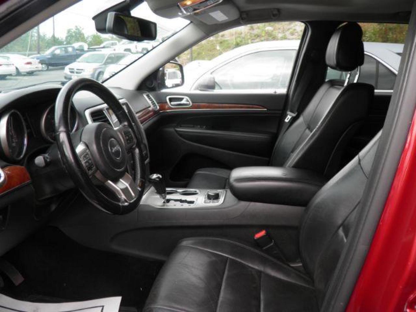 2013 Red Jeep Grand Cherokee Limited 4WD (1C4RJFBT0DC) with an 5.7L V8 engine, AT transmission, located at 15520 McMullen Hwy SW, Belair, MD, 21502, (301) 729-3700, 39.581375, -78.846451 - Photo#1
