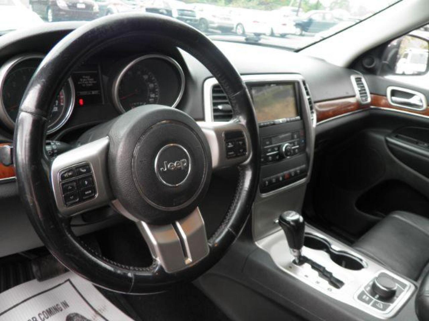 2013 Red Jeep Grand Cherokee Limited 4WD (1C4RJFBT0DC) with an 5.7L V8 engine, AT transmission, located at 15520 McMullen Hwy SW, Belair, MD, 21502, (301) 729-3700, 39.581375, -78.846451 - Photo#2
