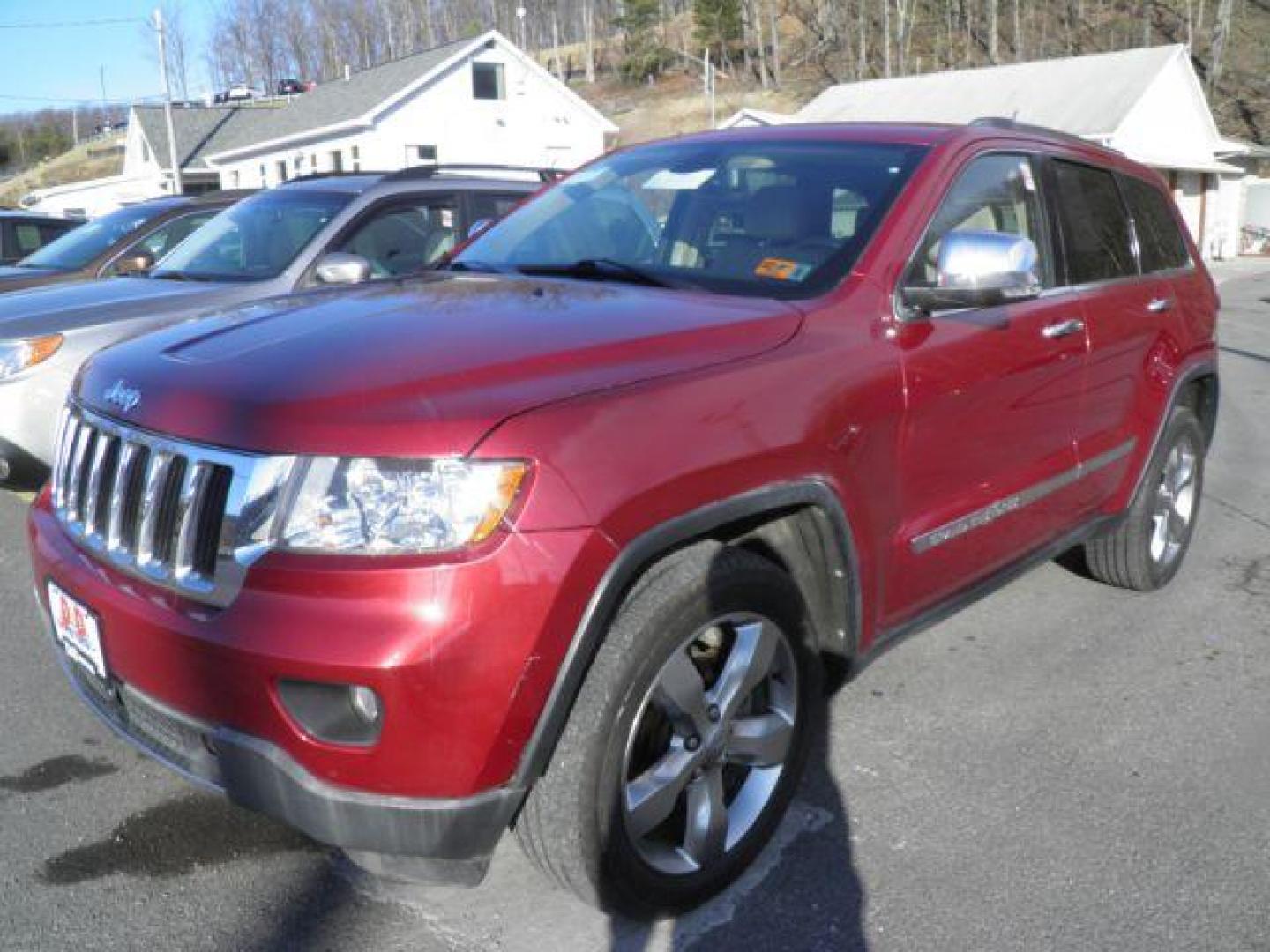 2013 Red Jeep Grand Cherokee Limited (1C4RJFBG8DC) with an 3.6L V6 engine, AT transmission, located at 15520 McMullen Hwy SW, Belair, MD, 21502, (301) 729-3700, 39.581375, -78.846451 - Photo#0
