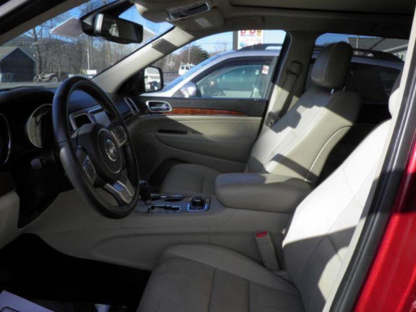 2013 Red Jeep Grand Cherokee Limited (1C4RJFBG8DC) with an 3.6L V6 engine, AT transmission, located at 15520 McMullen Hwy SW, Belair, MD, 21502, (301) 729-3700, 39.581375, -78.846451 - Photo#1