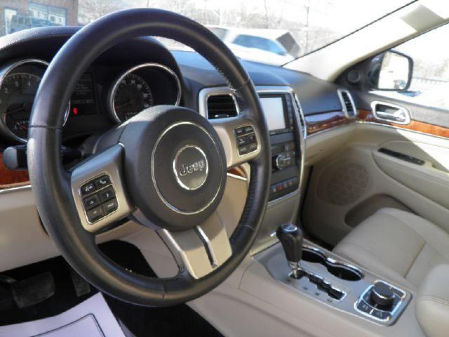 2013 Red Jeep Grand Cherokee Limited (1C4RJFBG8DC) with an 3.6L V6 engine, AT transmission, located at 15520 McMullen Hwy SW, Belair, MD, 21502, (301) 729-3700, 39.581375, -78.846451 - Photo#2