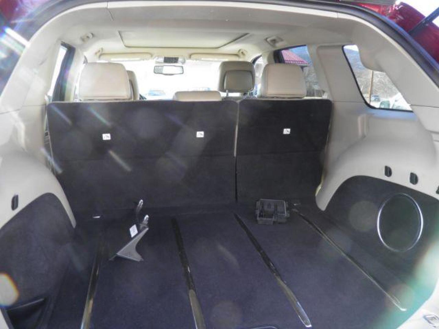 2013 Red Jeep Grand Cherokee Limited (1C4RJFBG8DC) with an 3.6L V6 engine, AT transmission, located at 15520 McMullen Hwy SW, Belair, MD, 21502, (301) 729-3700, 39.581375, -78.846451 - Photo#4