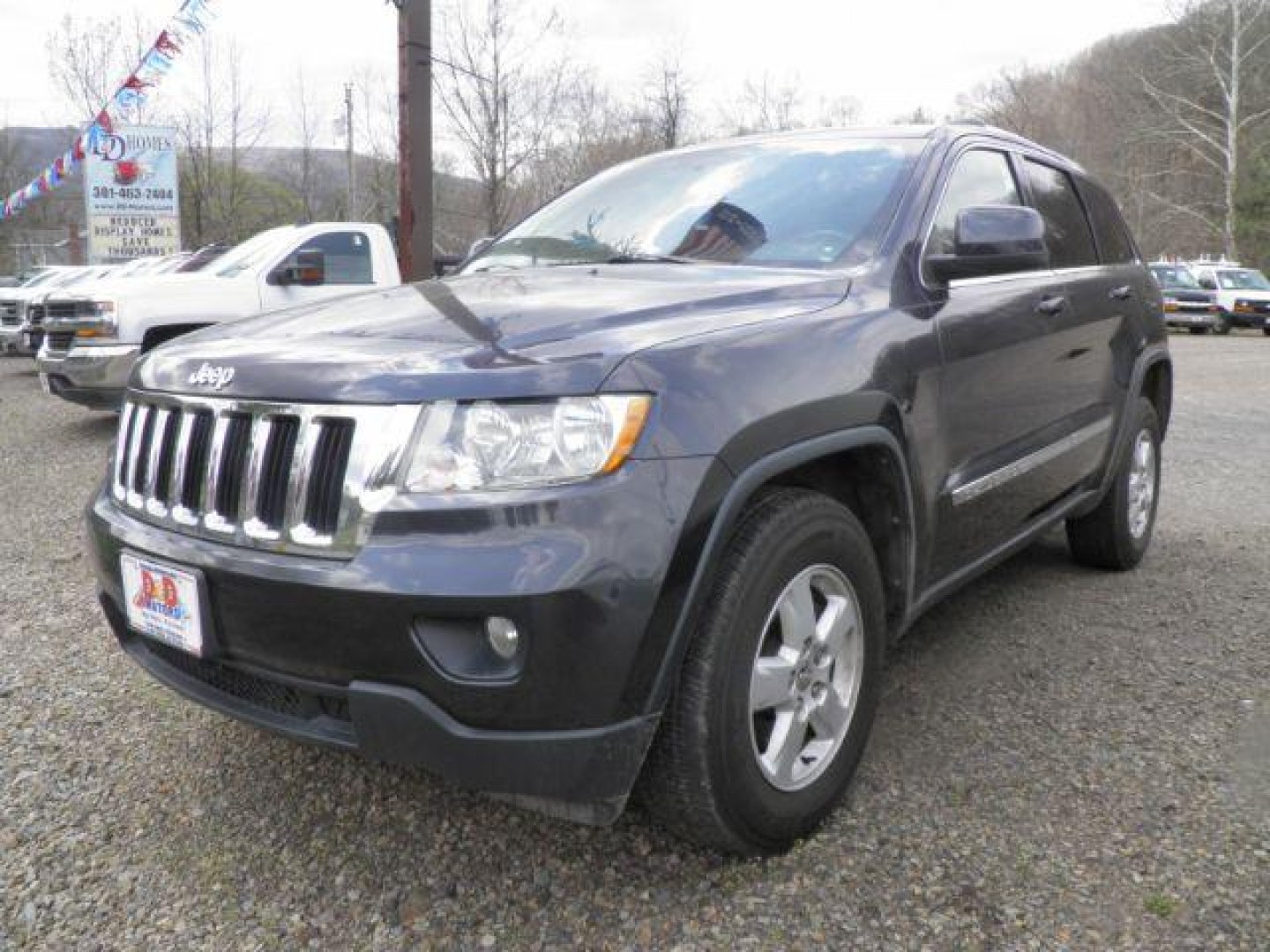 2013 BLACK Jeep Grand Cherokee Laredo (1C4RJFAG5DC) with an 3.6L V6 engine, AT transmission, located at 19521 New George's Creek Rd SW, Barton, MD, 21521, (301) 463-2404, 39.524323, -79.017906 - Photo#0