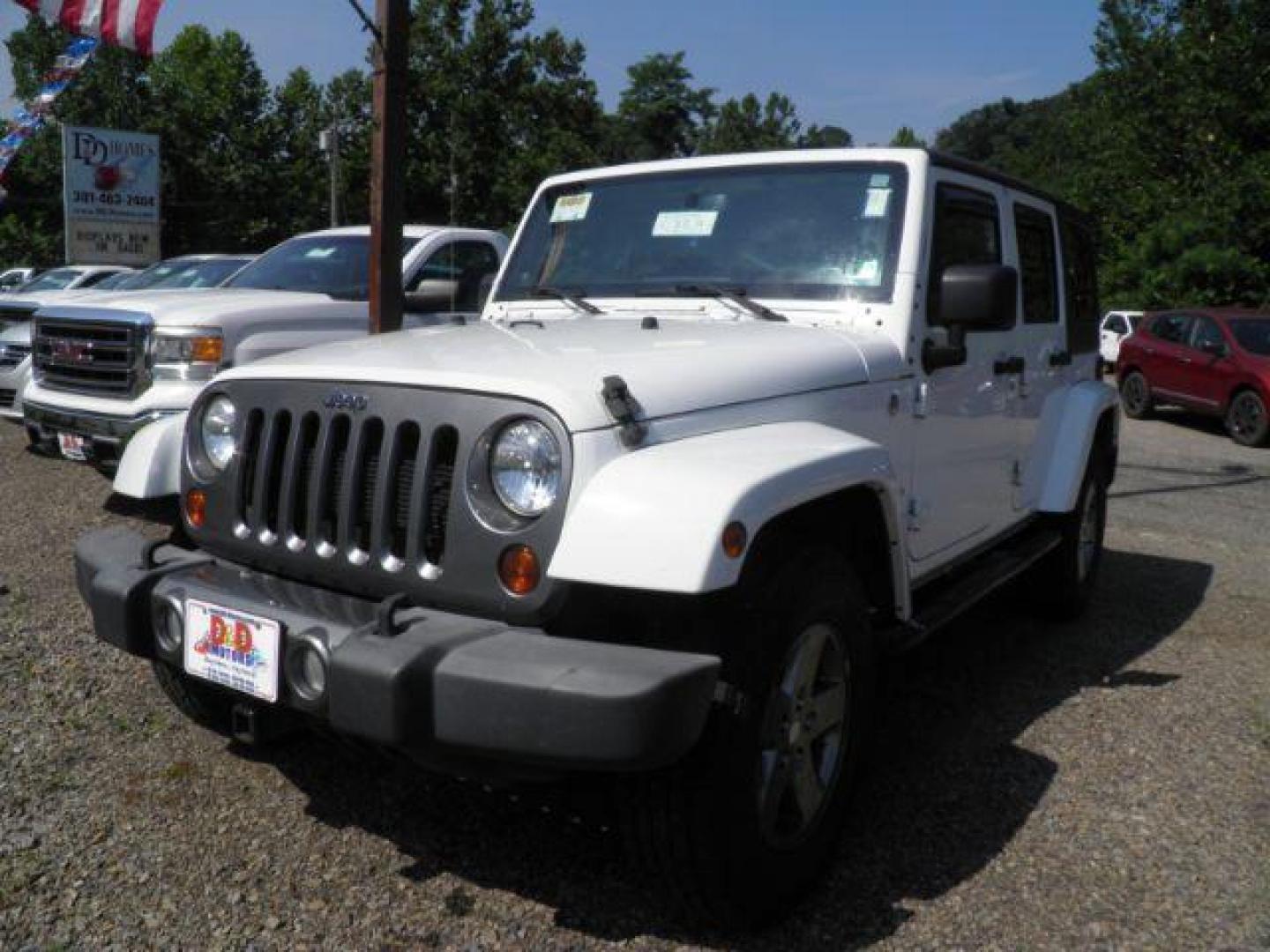 2013 White Jeep Wrangler Unlimited Freedom Edition (1C4BJWDG2DL) with an 3.6L V6 engine, AT transmission, located at 15520 McMullen Hwy SW, Belair, MD, 21502, (301) 729-3700, 39.581375, -78.846451 - Photo#0