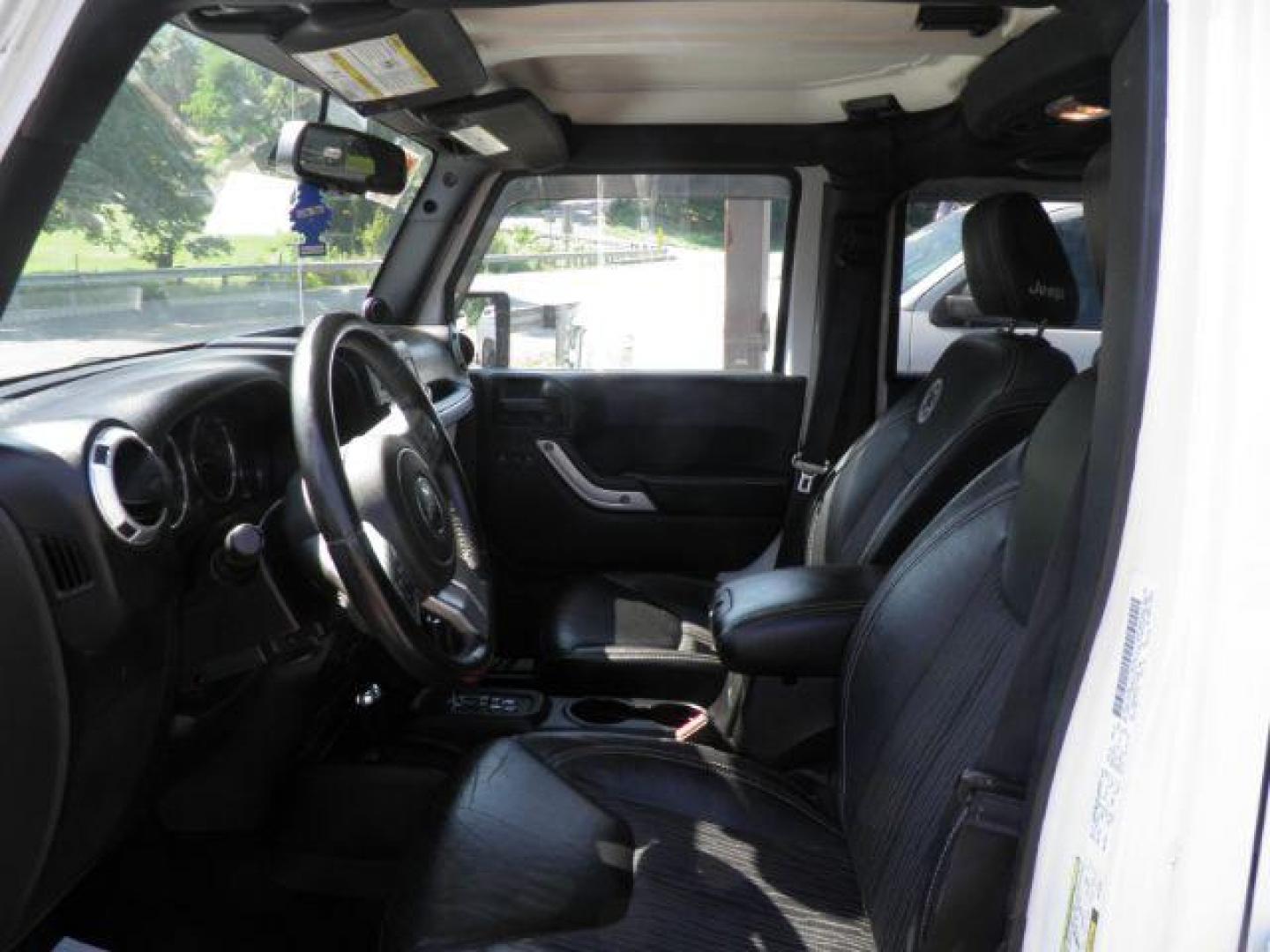 2013 White Jeep Wrangler Unlimited Freedom Edition (1C4BJWDG2DL) with an 3.6L V6 engine, AT transmission, located at 15520 McMullen Hwy SW, Belair, MD, 21502, (301) 729-3700, 39.581375, -78.846451 - Photo#1