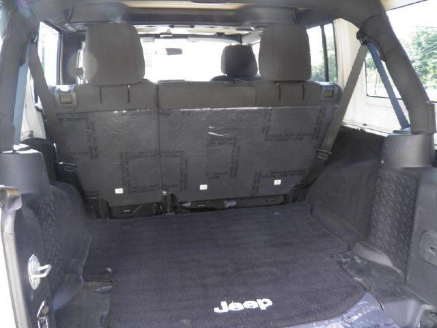 2013 White Jeep Wrangler Unlimited Sport (1C4BJWDGXDL) with an 3.6L V6 engine, AT transmission, located at 15520 McMullen Hwy SW, Belair, MD, 21502, (301) 729-3700, 39.581375, -78.846451 - Photo#4