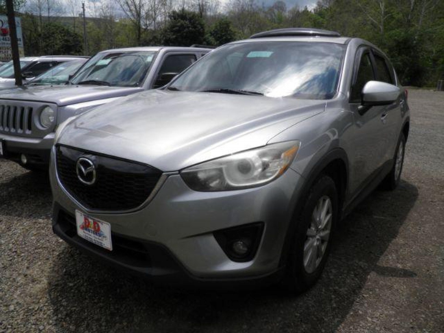 2013 SILVER Mazda CX-5 Touring (JM3KE4CE9D0) with an 2.4L L4 engine, CVT transmission, located at 19521 New George's Creek Rd SW, Barton, MD, 21521, (301) 463-2404, 39.524323, -79.017906- Photo#0