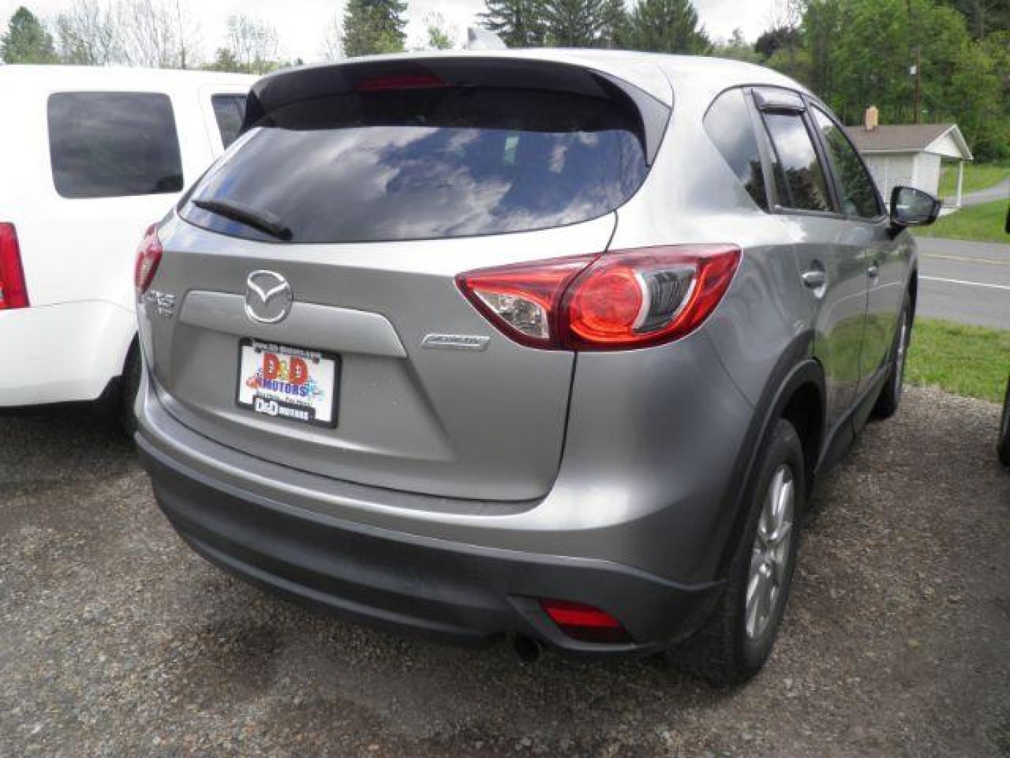 2013 SILVER Mazda CX-5 Touring (JM3KE4CE9D0) with an 2.4L L4 engine, CVT transmission, located at 19521 New George's Creek Rd SW, Barton, MD, 21521, (301) 463-2404, 39.524323, -79.017906- Photo#5