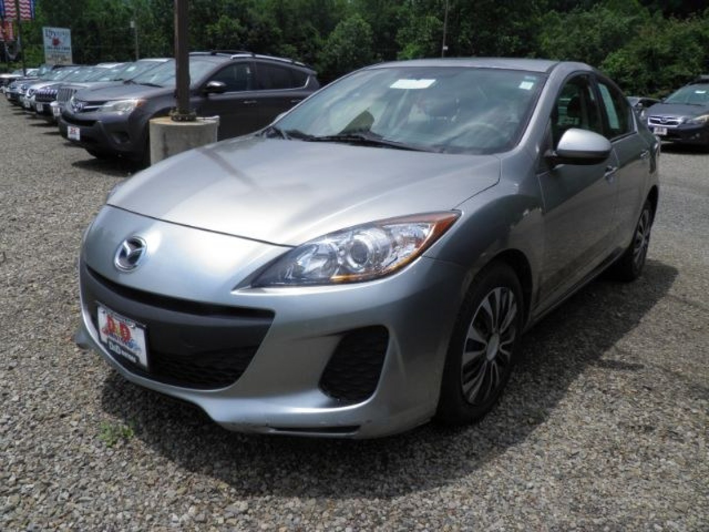 2013 SILVER Mazda MAZDA3 i SV AT 4-Door (JM1BL1TGXD1) with an 2.0L L4 DOHC 16V engine, 5-Speed Automatic transmission, located at 19521 New George's Creek Rd SW, Barton, MD, 21521, (301) 463-2404, 39.524323, -79.017906- Photo#0