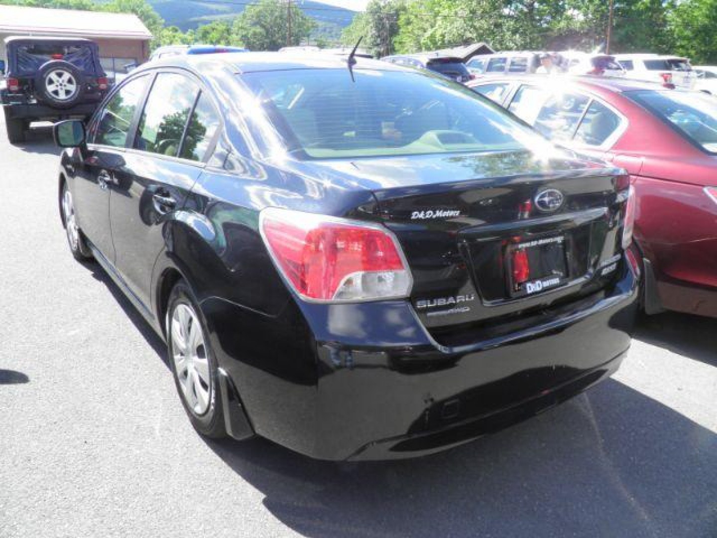 2013 BLACK SUBARU IMPREZA Base 4-Door (JF1GJAA62DH) with an 2.0L L4 engine, AT transmission, located at 15520 McMullen Hwy SW, Belair, MD, 21502, (301) 729-3700, 39.581375, -78.846451- Photo#4