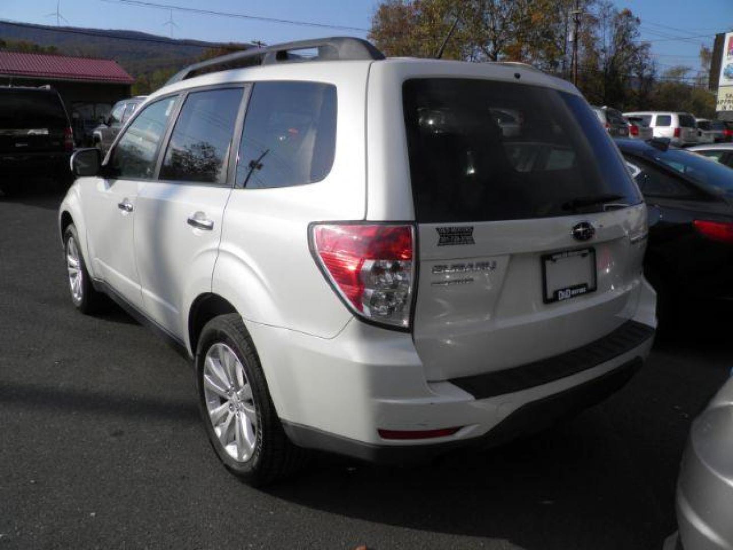 2013 White Subaru Forester 2.5X Premium (JF2SHADC5DH) with an 2.5L H4 engine, AT transmission, located at 15520 McMullen Hwy SW, Belair, MD, 21502, (301) 729-3700, 39.581375, -78.846451 - Photo#5