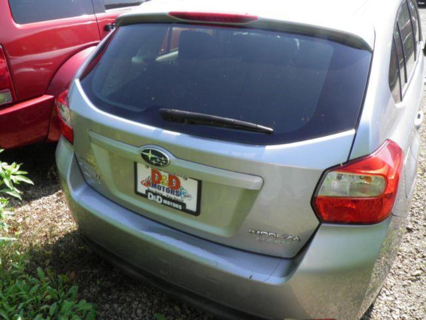 2013 Blue Subaru Impreza Premium Plus 5-Door+ (JF1GPAD61DH) with an 2.0L H4 engine, AT transmission, located at 19521 New George's Creek Rd SW, Barton, MD, 21521, (301) 463-2404, 39.524323, -79.017906 - Photo#4