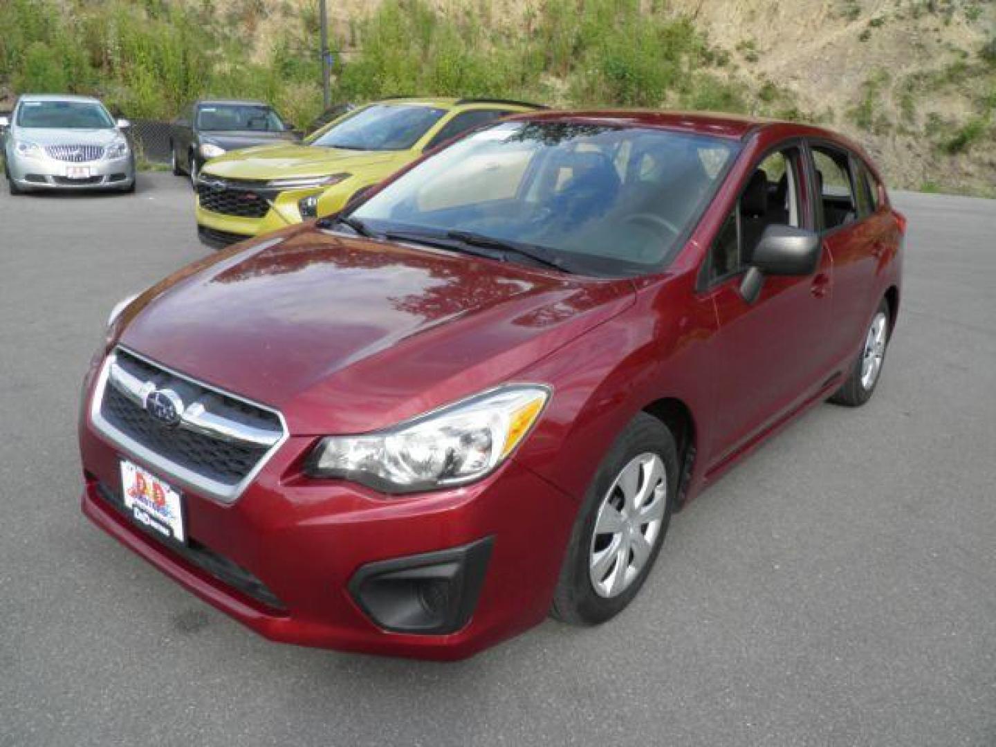 2013 Red Subaru Impreza 2.0i (JF1GPAA61DH) with an 2.0L H4 engine, AT transmission, located at 15520 McMullen Hwy SW, Belair, MD, 21502, (301) 729-3700, 39.581375, -78.846451 - Photo#0