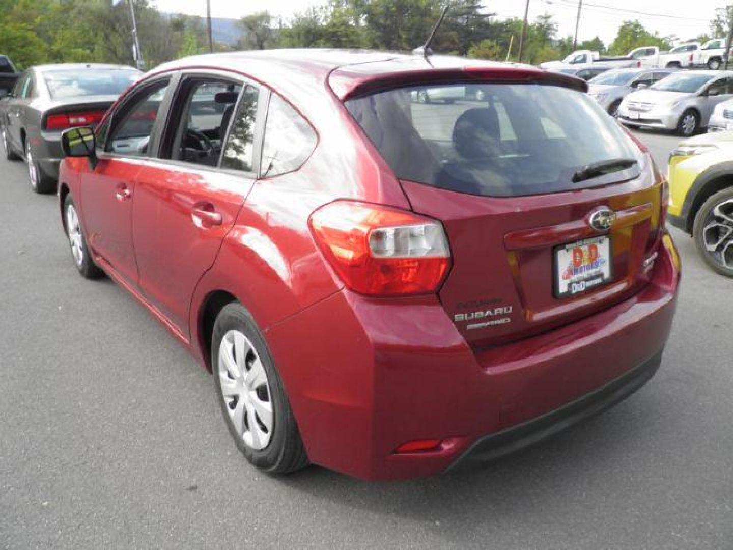 2013 Red Subaru Impreza 2.0i (JF1GPAA61DH) with an 2.0L H4 engine, AT transmission, located at 15520 McMullen Hwy SW, Belair, MD, 21502, (301) 729-3700, 39.581375, -78.846451 - Photo#5