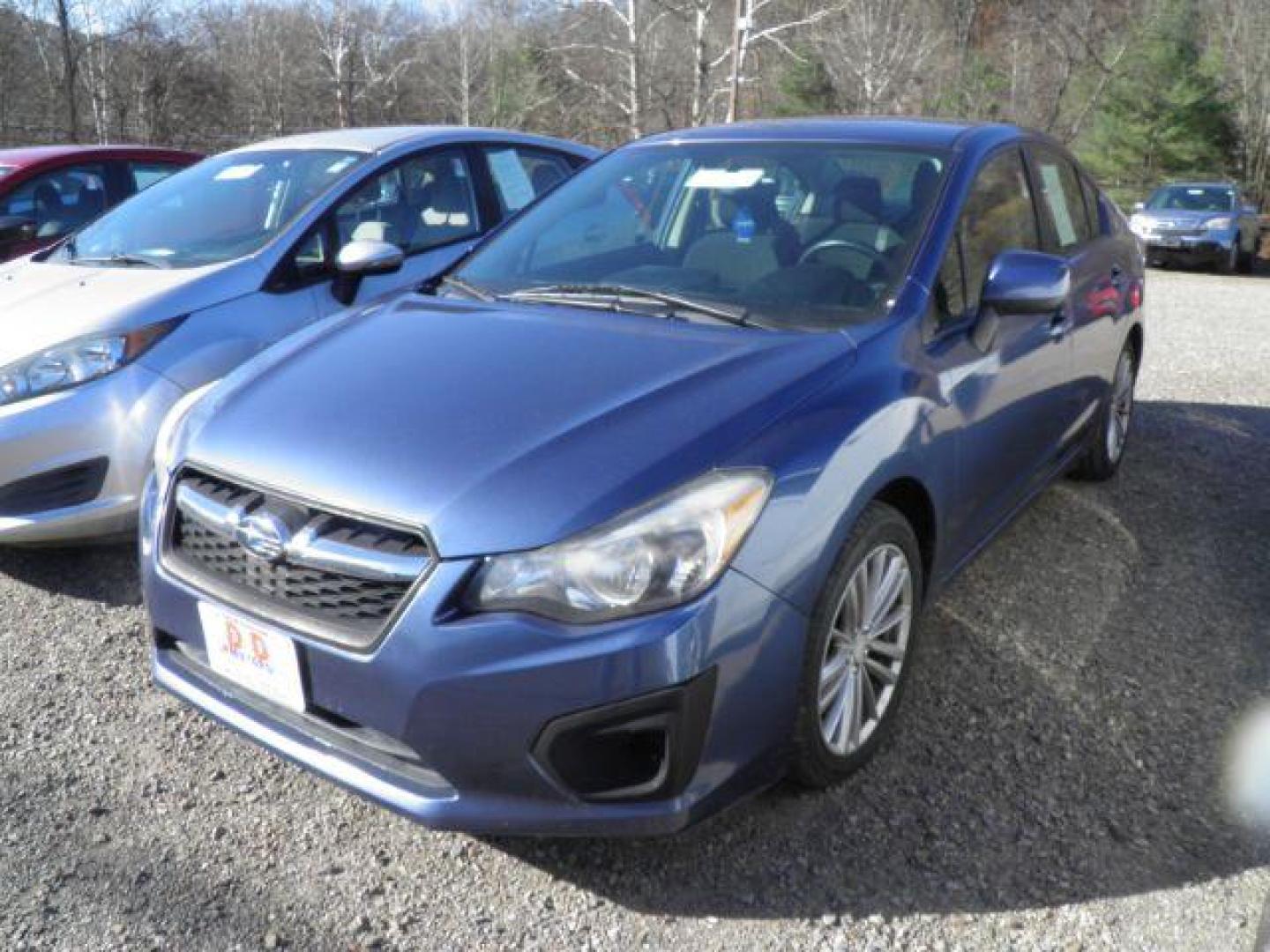2013 BLUE Subaru Impreza 2.0i Premium (JF1GJAE60DH) with an 2.4L L4 engine, CVT transmission, located at 19521 New George's Creek Rd SW, Barton, MD, 21521, (301) 463-2404, 39.524323, -79.017906 - Photo#0