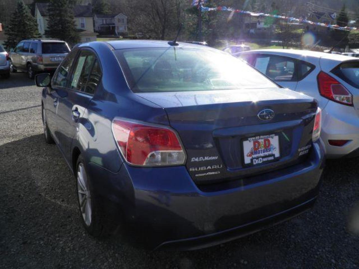 2013 BLUE Subaru Impreza 2.0i Premium (JF1GJAE60DH) with an 2.4L L4 engine, CVT transmission, located at 19521 New George's Creek Rd SW, Barton, MD, 21521, (301) 463-2404, 39.524323, -79.017906 - Photo#4