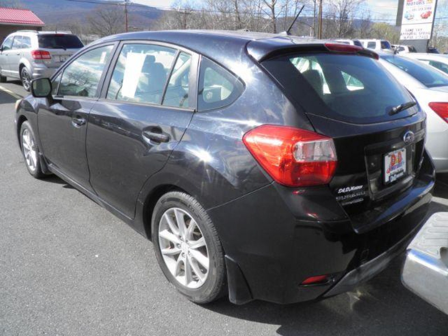 2013 BLACK Subaru Impreza 2.0i Premium (JF1GPAC68D2) with an 2.4L 4 engine, AT transmission, located at 15520 McMullen Hwy SW, Belair, MD, 21502, (301) 729-3700, 39.581375, -78.846451- Photo#4