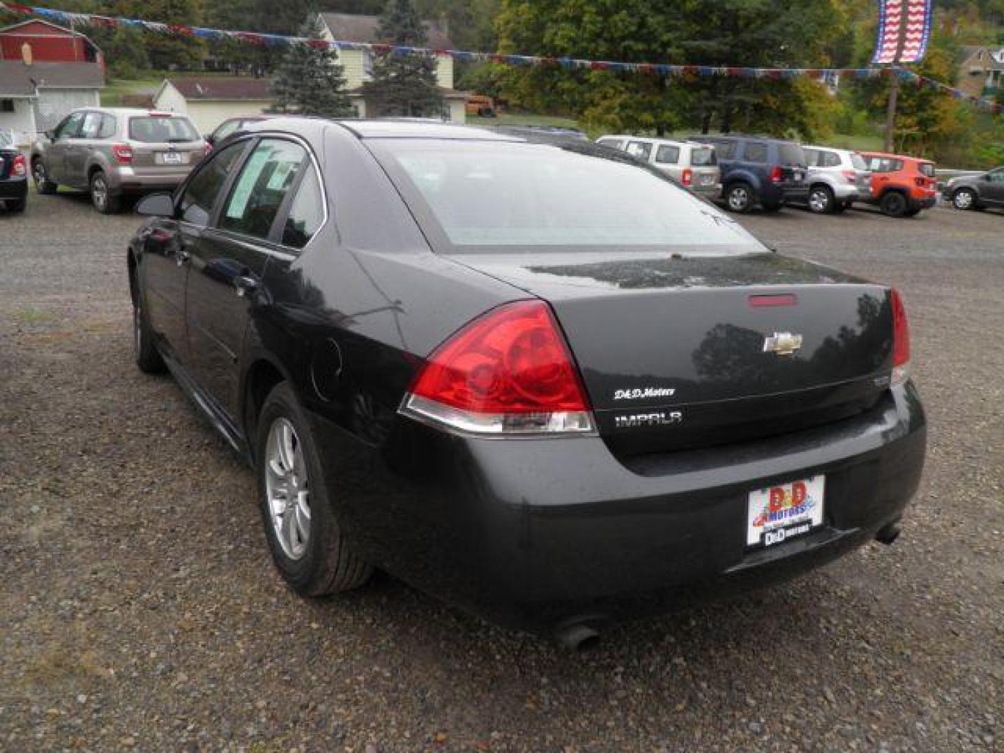 2014 Gray Chevrolet Impala Limited LS (2G1WA5E35E1) with an 3.6L V6 engine, AT transmission, located at 19521 New George's Creek Rd SW, Barton, MD, 21521, (301) 463-2404, 39.524323, -79.017906 - Photo#4