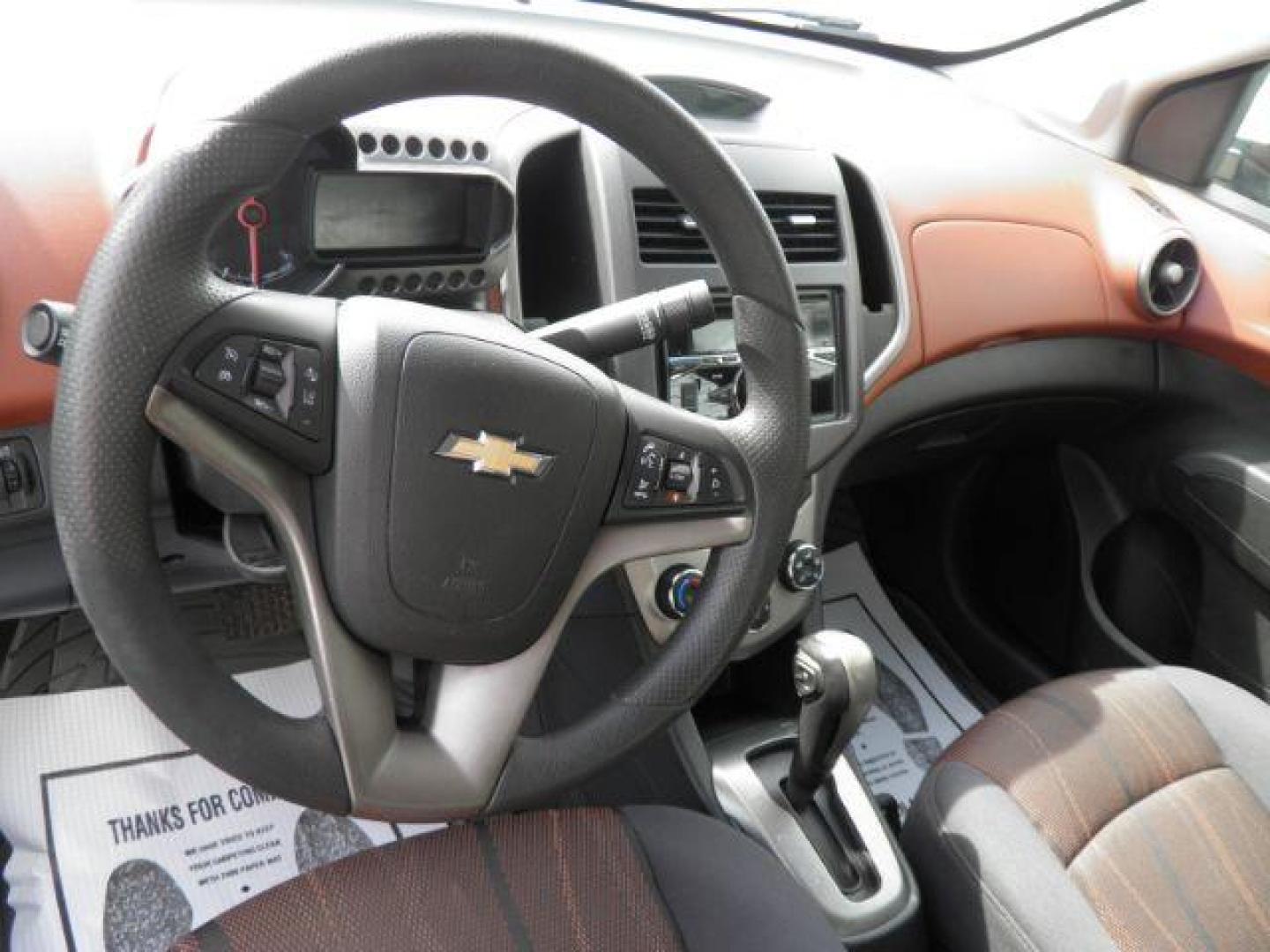 2014 Silver Chevrolet Sonic LT Auto Sedan (1G1JC5SH2E4) with an 1.8L I4 engine, AT transmission, located at 19521 New George's Creek Rd SW, Barton, MD, 21521, (301) 463-2404, 39.524323, -79.017906 - Photo#1