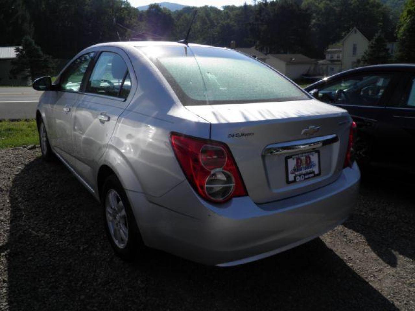 2014 Silver Chevrolet Sonic LT Auto Sedan (1G1JC5SH3E4) with an 1.8L I4 engine, AT transmission, located at 19521 New George's Creek Rd SW, Barton, MD, 21521, (301) 463-2404, 39.524323, -79.017906 - Photo#4