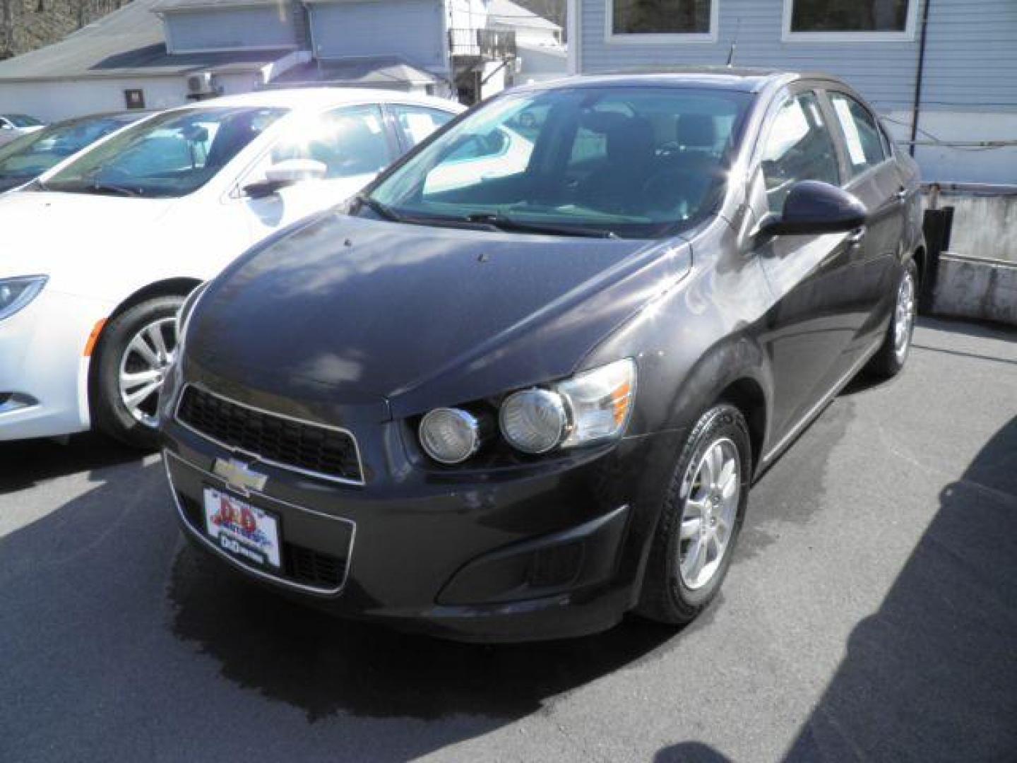 2014 Gray Chevrolet Sonic LT Auto Sedan (1G1JC5SH1E4) with an 1.8L I4 engine, AT transmission, located at 19521 New George's Creek Rd SW, Barton, MD, 21521, (301) 463-2404, 39.524323, -79.017906 - Photo#0