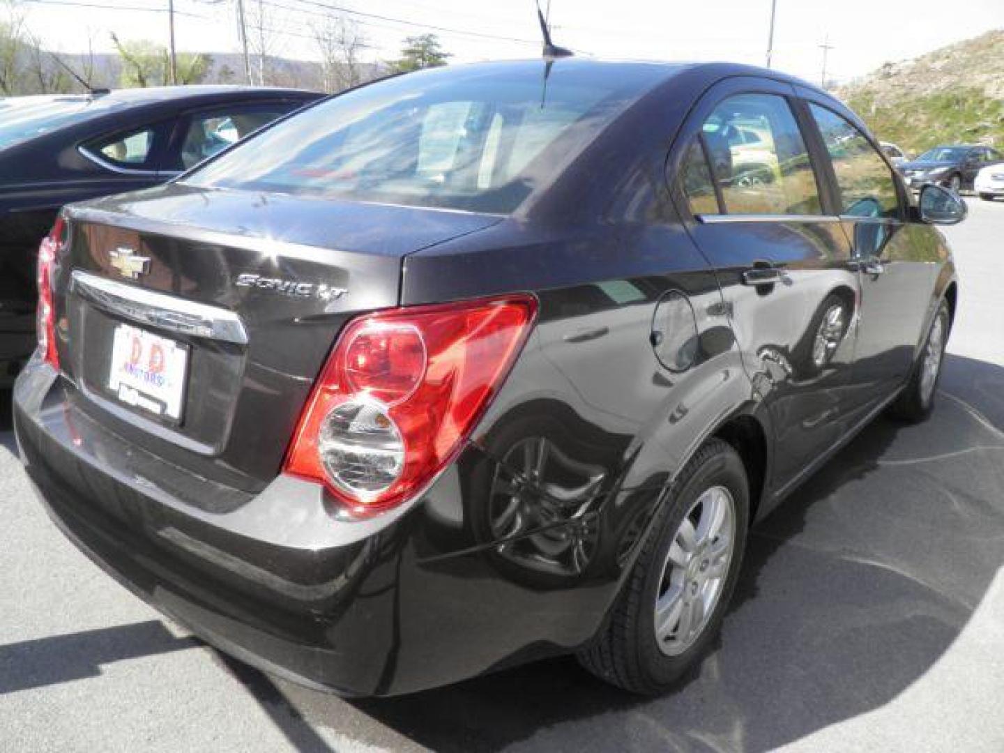 2014 Gray Chevrolet Sonic LT Auto Sedan (1G1JC5SH1E4) with an 1.8L I4 engine, AT transmission, located at 19521 New George's Creek Rd SW, Barton, MD, 21521, (301) 463-2404, 39.524323, -79.017906 - Photo#4
