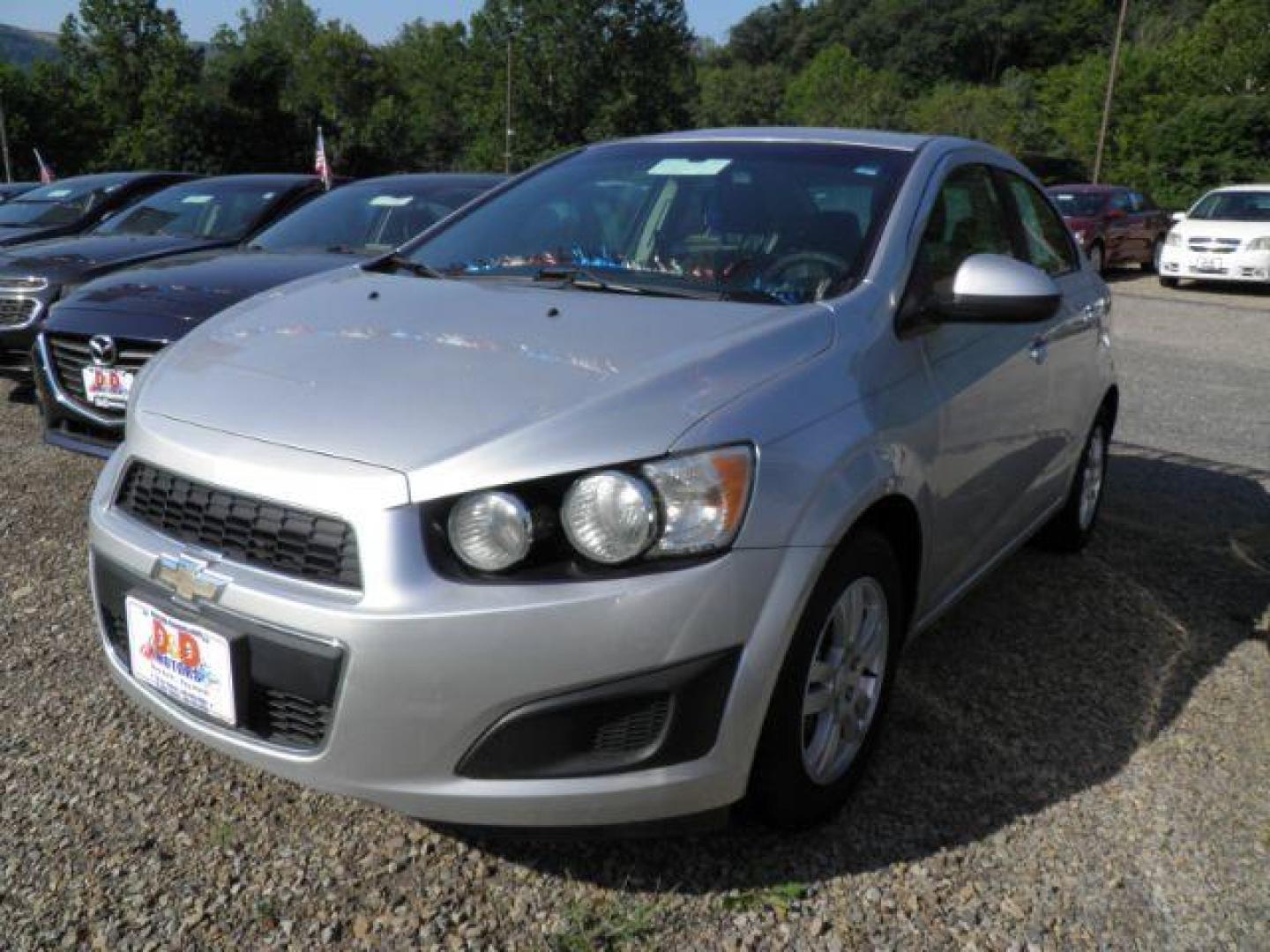 2014 Silver Chevrolet Sonic LT Auto Sedan (1G1JC5SH3E4) with an 1.8L I4 engine, AT transmission, located at 19521 New George's Creek Rd SW, Barton, MD, 21521, (301) 463-2404, 39.524323, -79.017906 - Photo#0