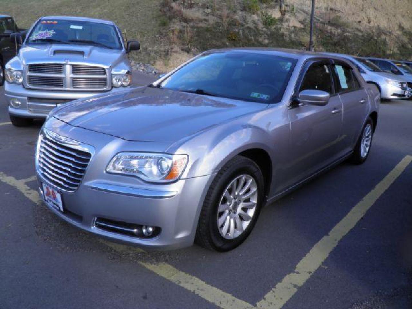 2014 Silver Chrysler 300 Base (2C3CCAAG0EH) with an 3.6L V6 engine, AT transmission, located at 15520 McMullen Hwy SW, Belair, MD, 21502, (301) 729-3700, 39.581375, -78.846451 - Photo#0