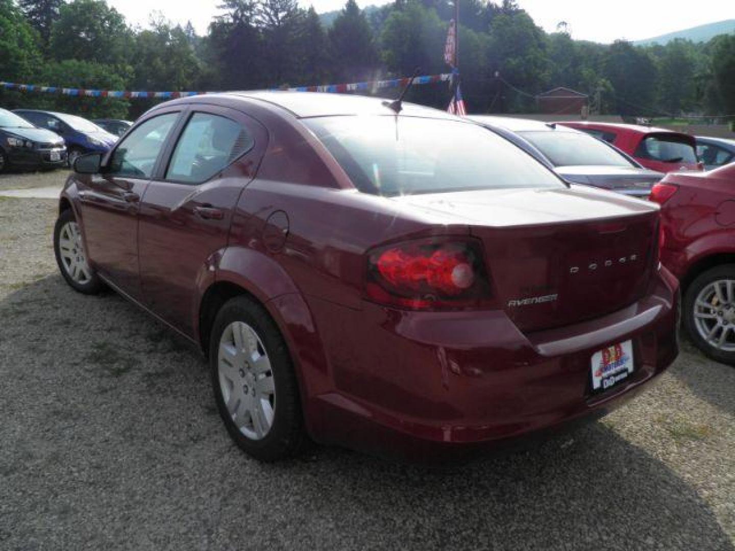 2014 Red Dodge Avenger SE (1C3CDZAB6EN) with an 3.6L V6 engine, located at 19521 New George's Creek Rd SW, Barton, MD, 21521, (301) 463-2404, 39.524323, -79.017906 - Photo#4