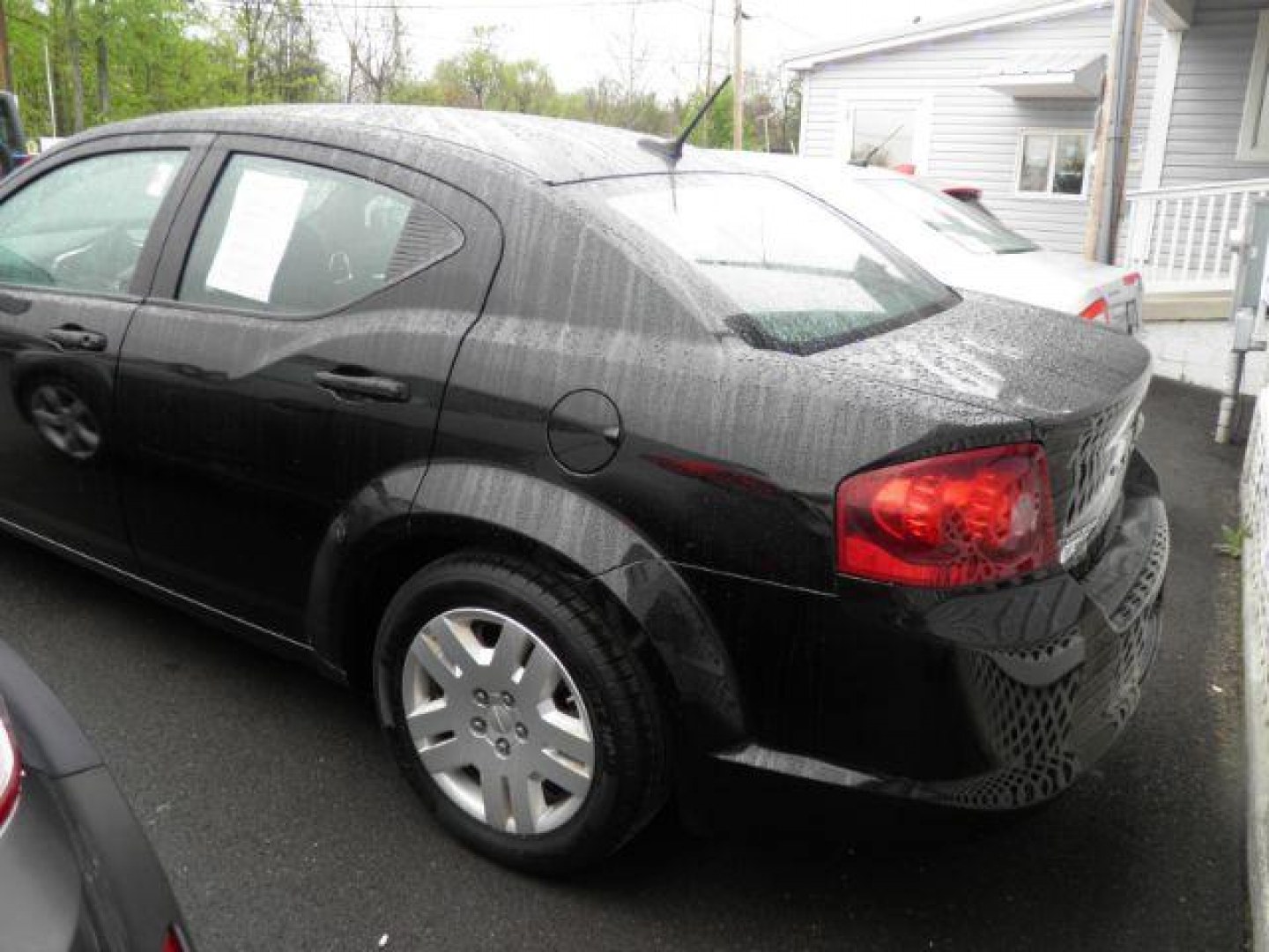 2014 BLACK Dodge Avenger SE (1C3CDZAB7EN) with an 2.4L L4 engine, AT transmission, located at 15520 McMullen Hwy SW, Belair, MD, 21502, (301) 729-3700, 39.581375, -78.846451 - Photo#4