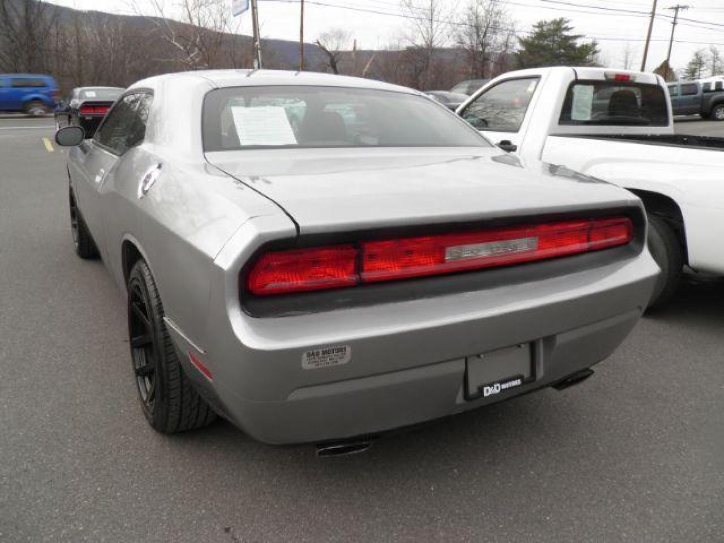 2014 Silver Dodge Challenger SXT (2C3CDYAG2EH) with an 3.6L V6 engine, AT transmission, located at 15520 McMullen Hwy SW, Belair, MD, 21502, (301) 729-3700, 39.581375, -78.846451 - Photo#4