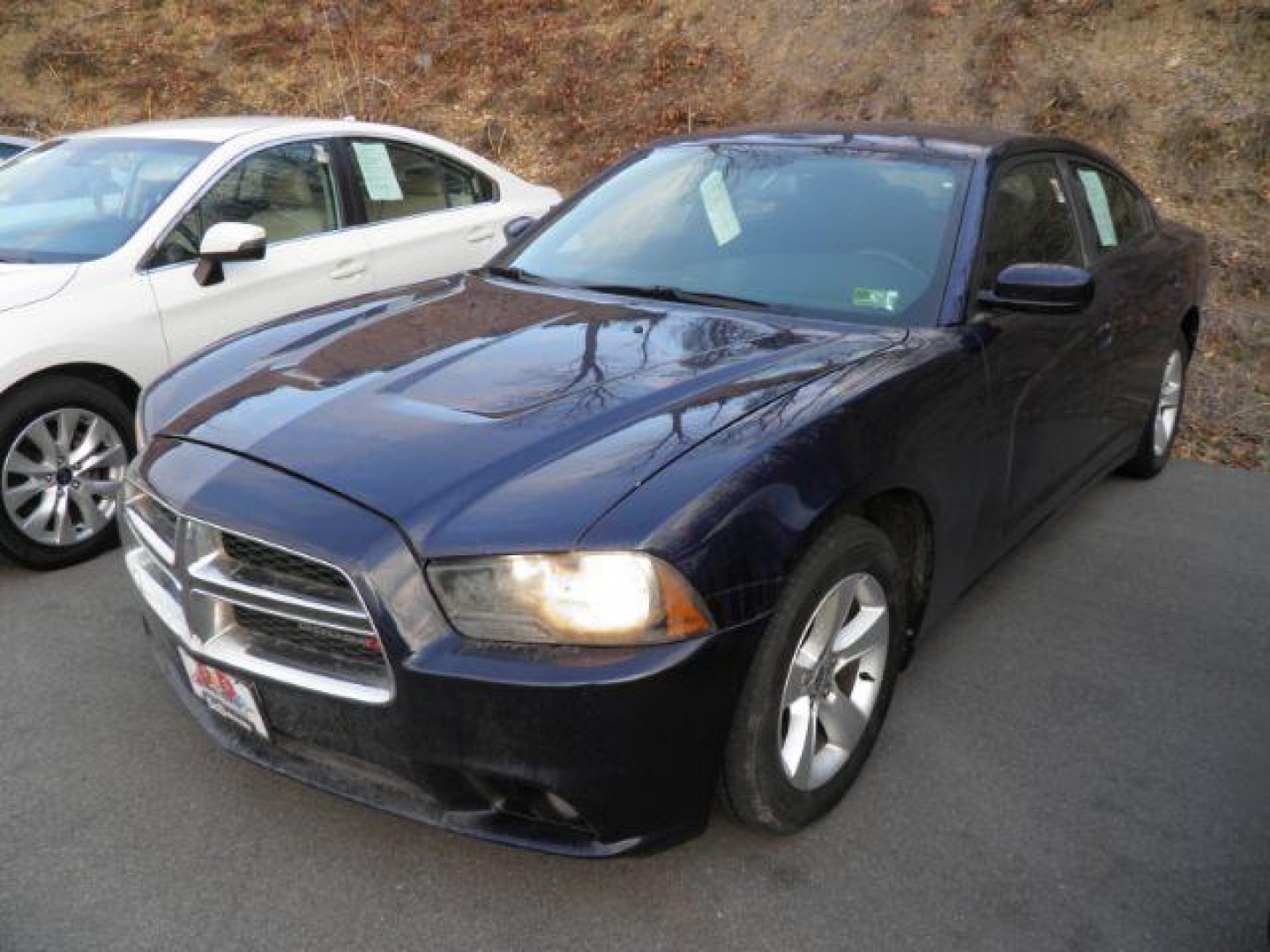 2014 Blue Dodge Charger SXT (2C3CDXHG9EH) with an 3.6L V6 engine, AT transmission, located at 19521 New George's Creek Rd SW, Barton, MD, 21521, (301) 463-2404, 39.524323, -79.017906 - Photo#0