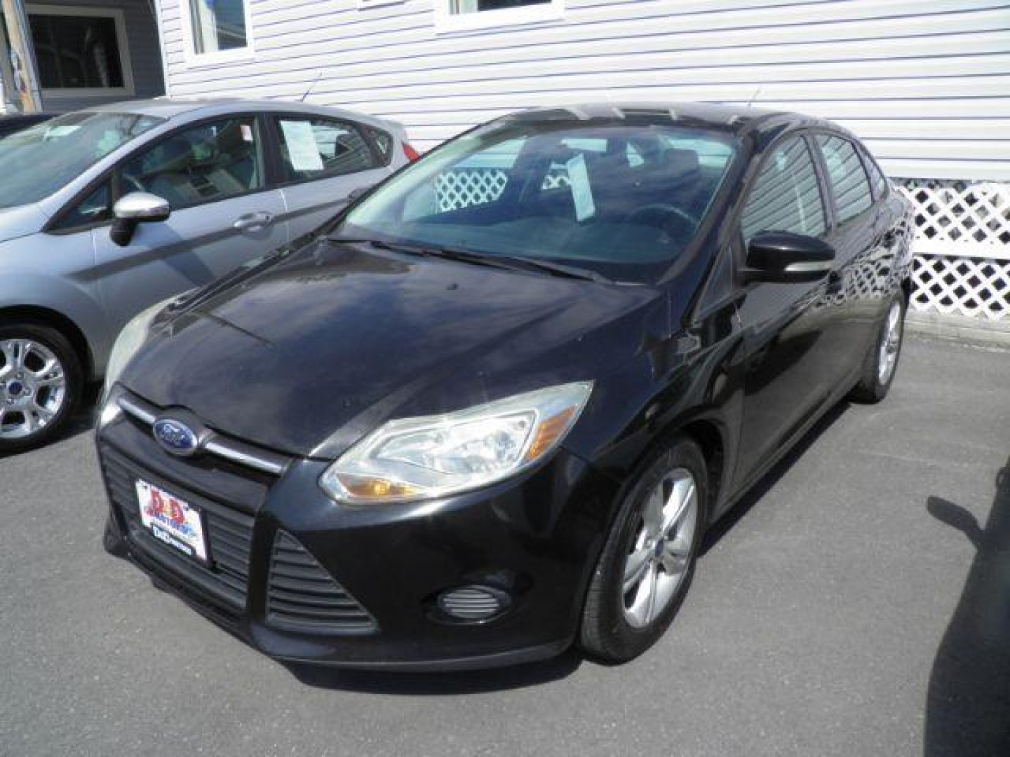 2014 BLACK Ford Focus SE Sedan (1FADP3F21EL) with an 2.0L L4 engine, AT transmission, located at 15520 McMullen Hwy SW, Belair, MD, 21502, (301) 729-3700, 39.581375, -78.846451- Photo#0